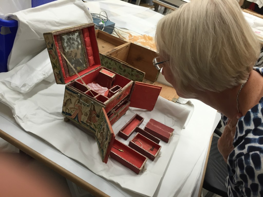Intricate trays within the Bourne casket